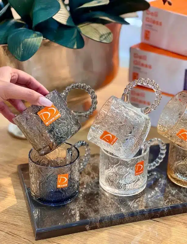 قیمت و خرید ماگ دسته حلقه ای طرح گل دودی DELI GLASS